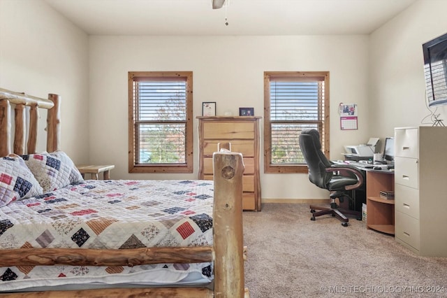 bedroom with light colored carpet and ceiling fan