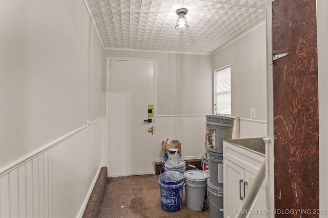 laundry room with ornamental molding