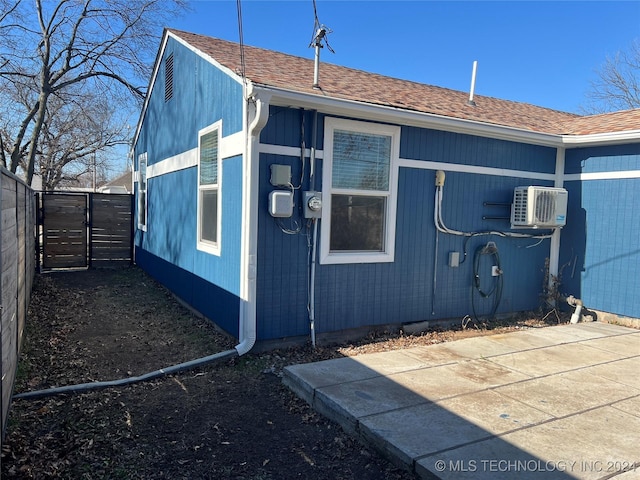 view of home's exterior featuring ac unit