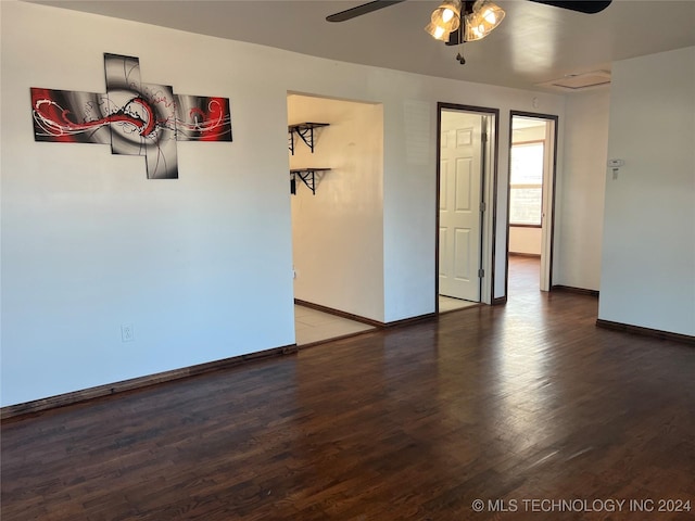 spare room featuring hardwood / wood-style floors and ceiling fan