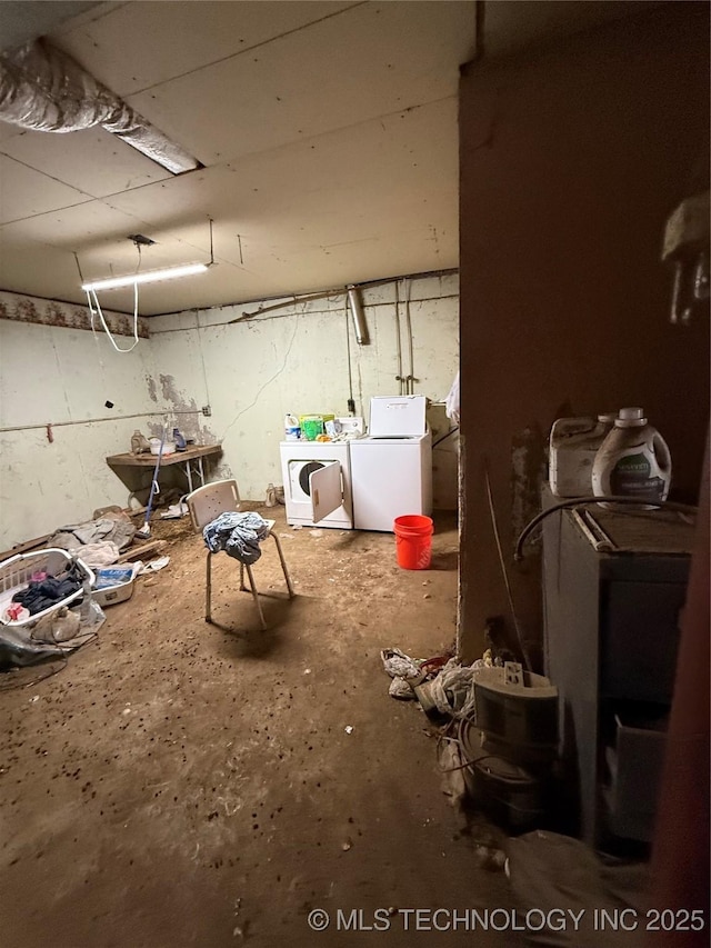 basement with washing machine and dryer