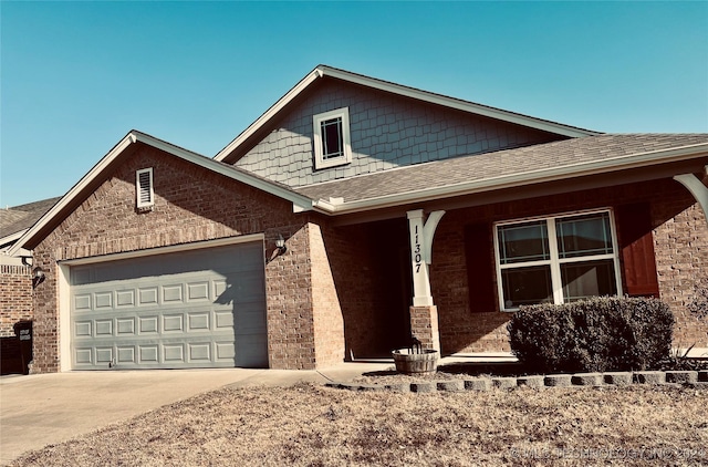 view of front of property with covered porch and a garage