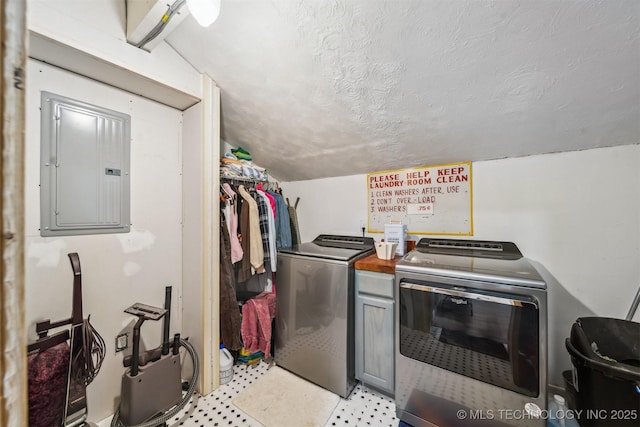 washroom with washer and dryer and electric panel