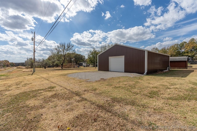 garage with a yard