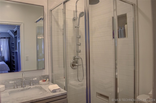 bathroom featuring vanity and walk in shower