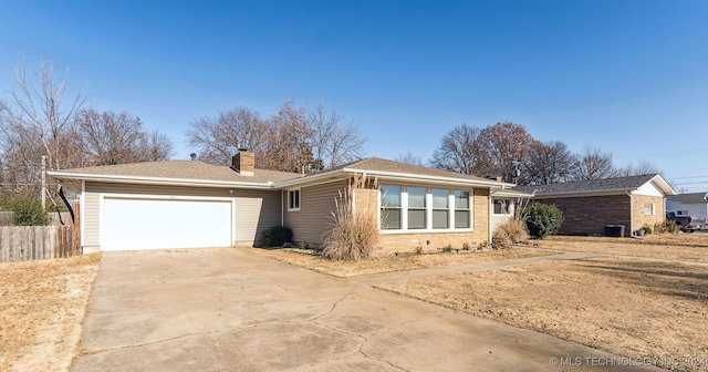 single story home featuring a garage