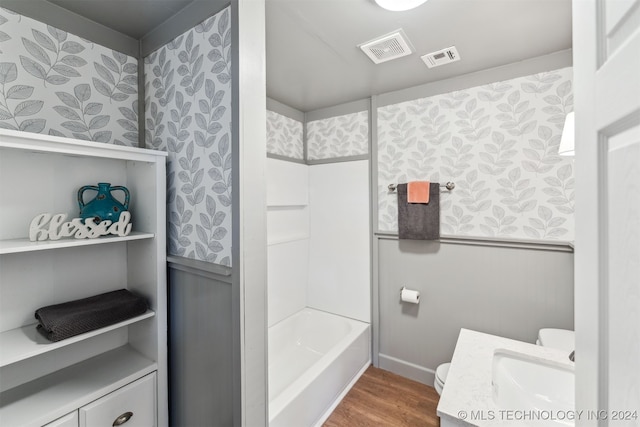 bathroom with vanity and hardwood / wood-style flooring