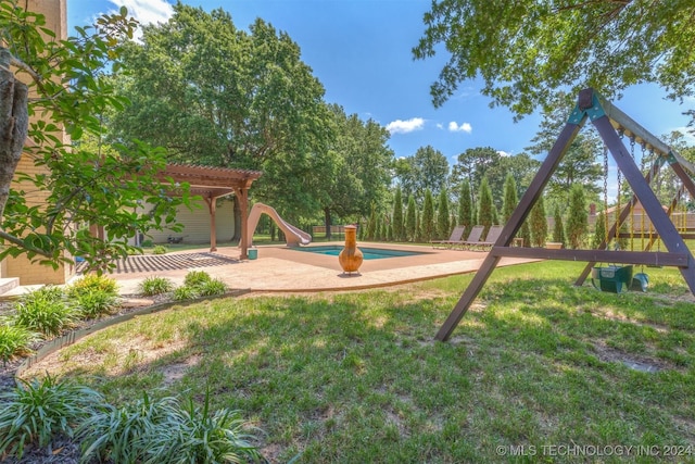 view of playground featuring a pergola, a patio, and a lawn