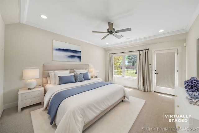 carpeted bedroom with ceiling fan and crown molding