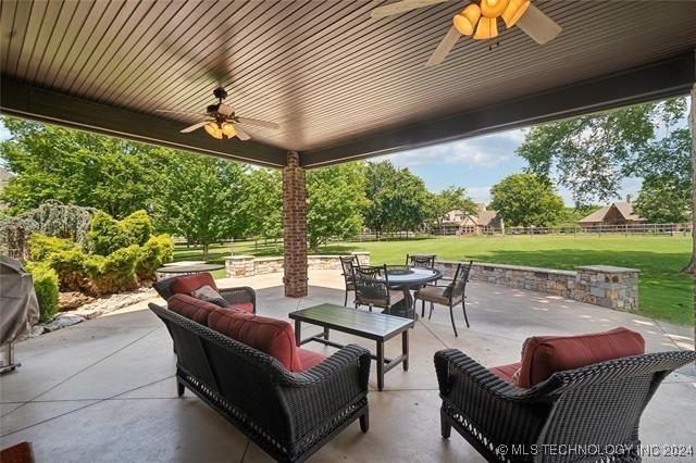 view of patio / terrace with outdoor lounge area and ceiling fan