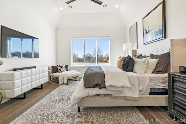 bedroom with lofted ceiling, visible vents, wood finished floors, and recessed lighting