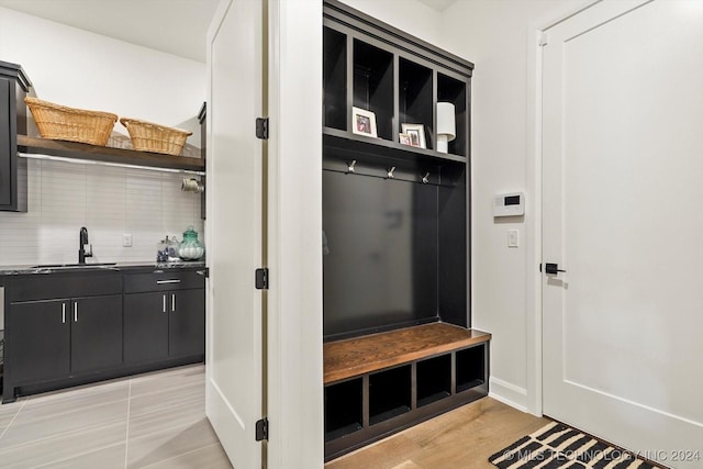 mudroom featuring a sink