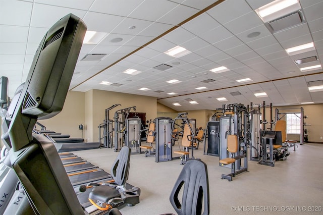 gym featuring a drop ceiling and visible vents