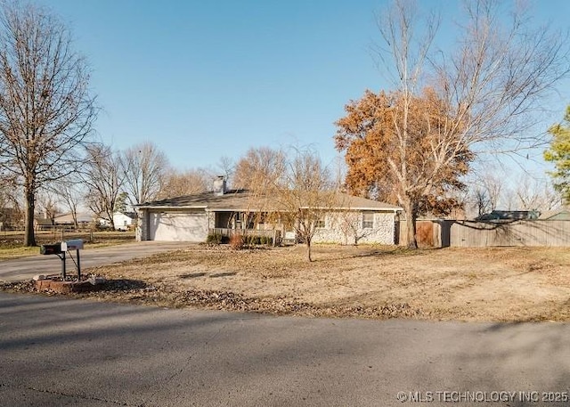 ranch-style house with a garage