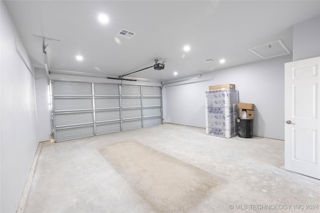 garage featuring a garage door opener