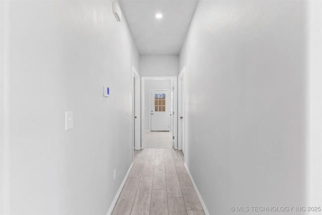 hallway featuring light hardwood / wood-style floors