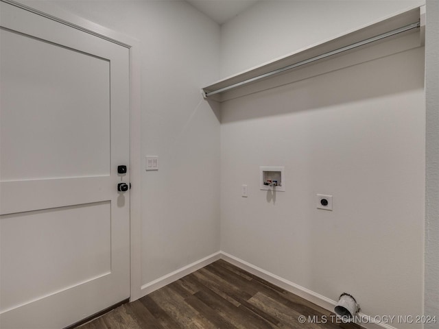 washroom featuring washer hookup, electric dryer hookup, and dark wood-type flooring