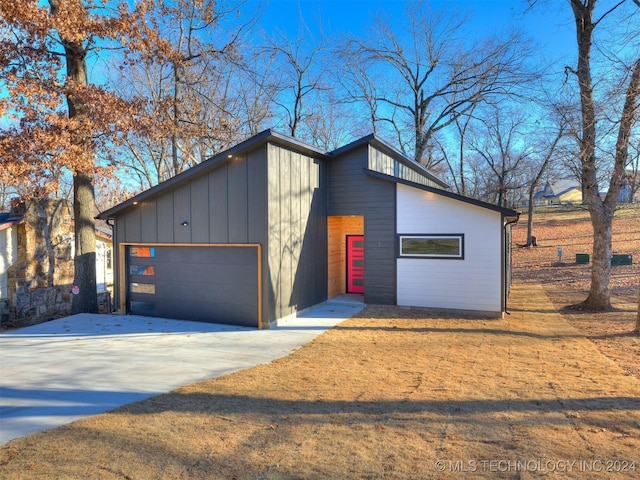 garage featuring driveway