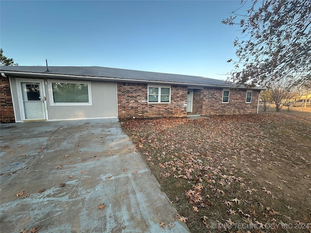 single story home featuring a patio area