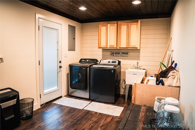 clothes washing area featuring wood ceiling, cabinets, dark hardwood / wood-style floors, and independent washer and dryer