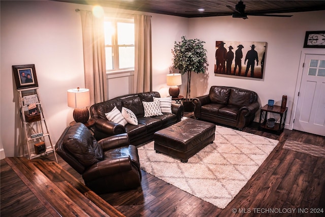 living room with hardwood / wood-style flooring and ceiling fan