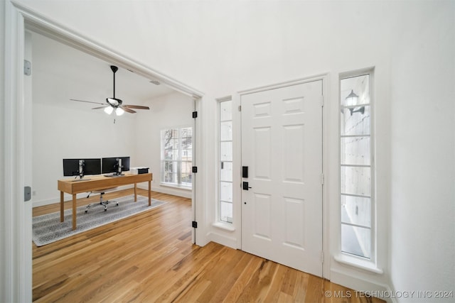 foyer featuring ceiling fan and hardwood / wood-style floors