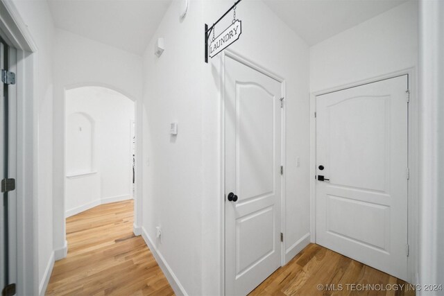 hall featuring hardwood / wood-style flooring