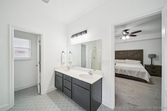 bathroom featuring vanity and ceiling fan