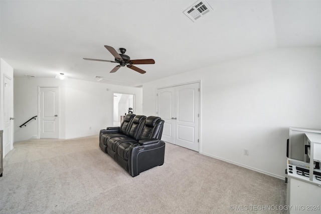 sitting room featuring ceiling fan and light colored carpet