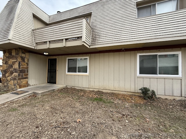 doorway to property with a balcony