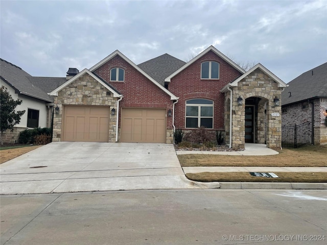 view of front of property featuring a garage