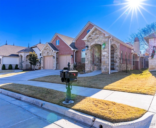 view of front of property with a garage