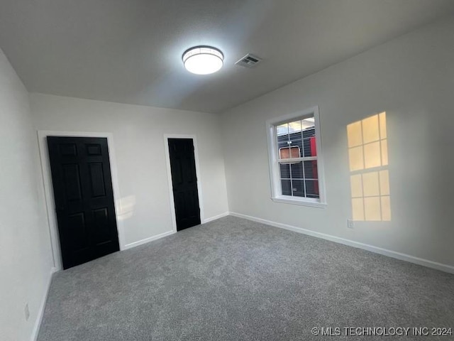 view of carpeted spare room