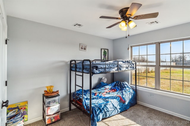 carpeted bedroom featuring ceiling fan