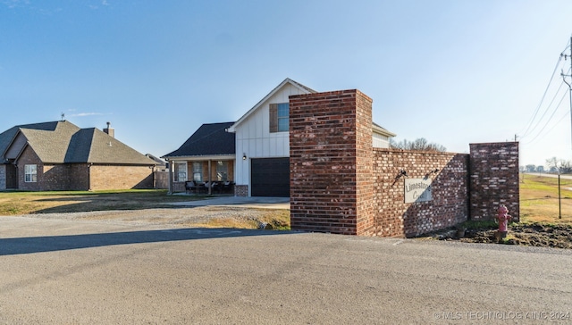 view of home's exterior with a garage