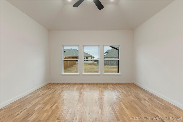 spare room featuring ceiling fan and light wood-type flooring