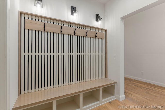 mudroom with hardwood / wood-style floors