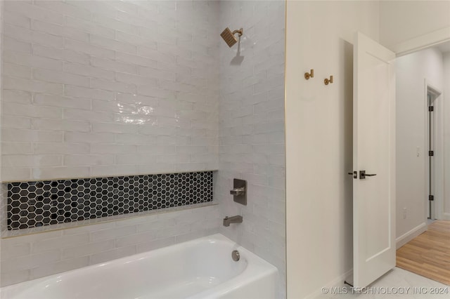 bathroom featuring washtub / shower combination