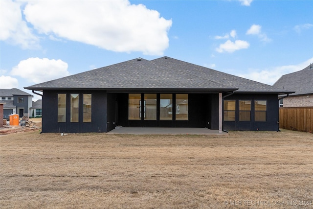 rear view of house with a patio area