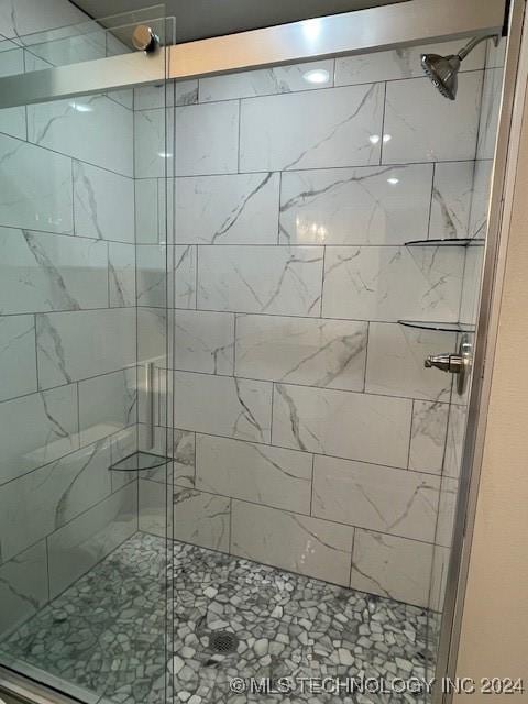 bathroom featuring walk in shower