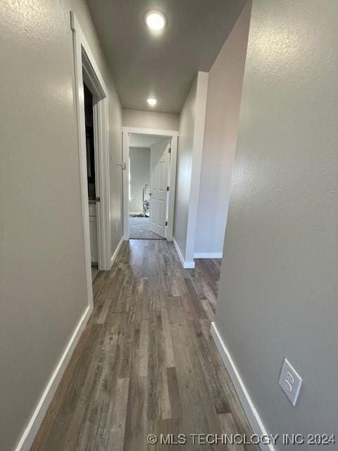 hall featuring dark hardwood / wood-style floors