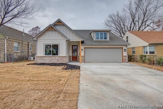 craftsman inspired home featuring a garage