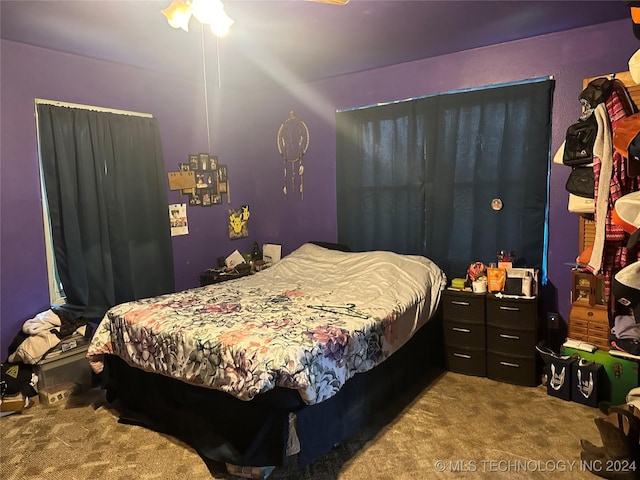 bedroom with carpet flooring and ceiling fan