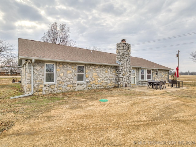 rear view of house with a patio area