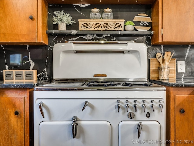 kitchen with brown cabinetry and decorative backsplash