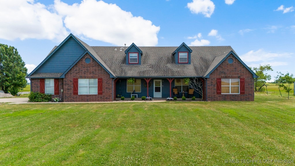 4205 S 4080th Rd, Talala, OK 74080 - cape cod home with a front lawn