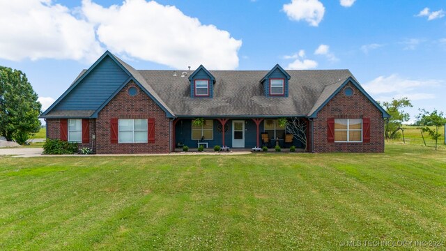 4205 S 4080th Rd, Talala, OK 74080 - cape cod home with a front lawn