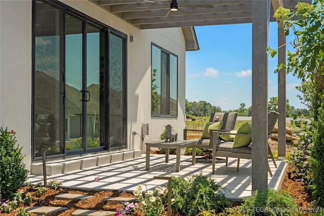 view of patio with ceiling fan