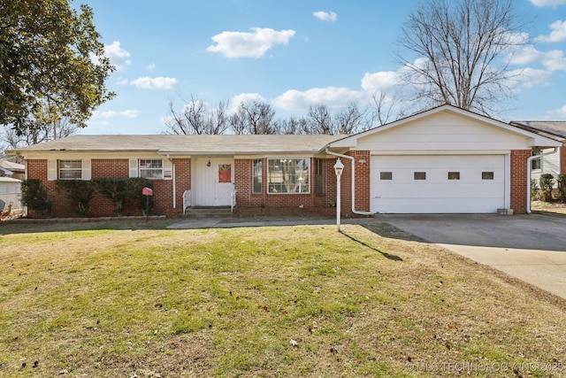 single story home featuring a garage and a front yard