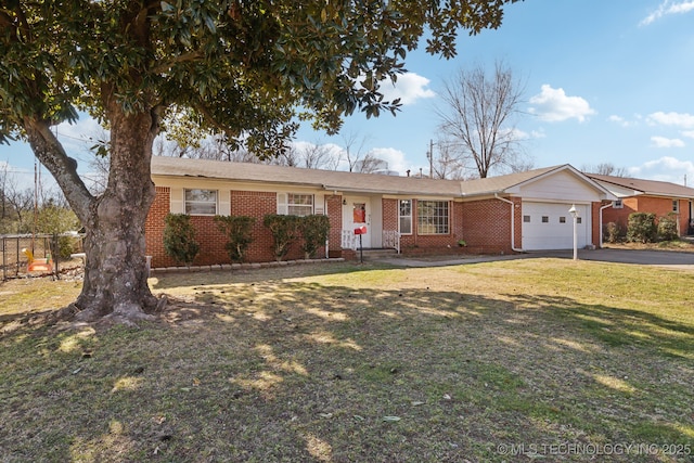 single story home featuring a garage and a front lawn